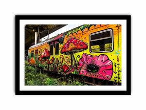 Colorful graffiti train wall art featuring psychedelic mushrooms, flowers and vibrant urban street art.