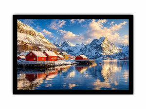 Scandinavian winter village wall art with snowy mountains and calm reflective water for cozy modern interiors.