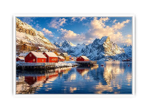 Scandinavian winter village wall art with snowy mountains and calm reflective water for cozy modern interiors.