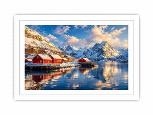 Scandinavian winter village wall art with snowy mountains and calm reflective water for cozy modern interiors.