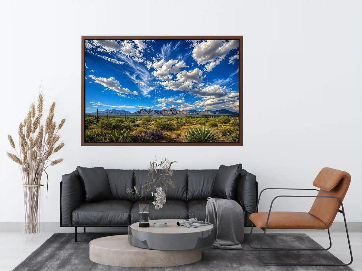 Southwestern desert landscape wall art with dramatic blue sky, mountains, and cactus scenery