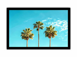 Palm trees against a bright blue sky in tropical landscape artwork