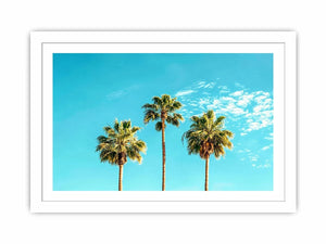 Palm trees against a bright blue sky in tropical landscape artwork