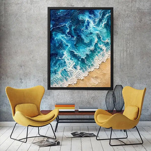 Textured abstract ocean waves crashing onto a sandy shoreline in rich turquoise and deep blue tones