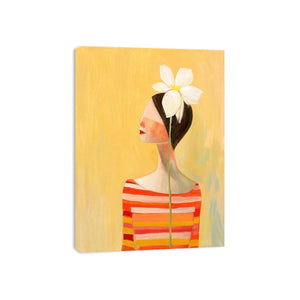 Minimal woman portrait canvas art with white flower and warm modern tones for bedroom decor.