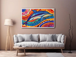 Vibrant dolphin canvas wall art for colorful coastal living room decor.