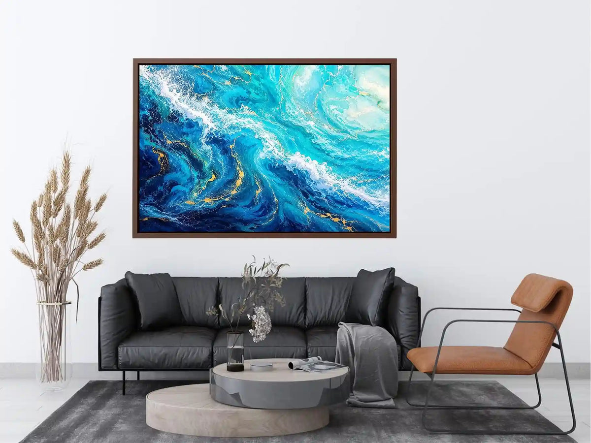 Abstract ocean wave canvas art in teal and white for modern coastal living room decor.