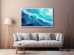 Abstract ocean wave canvas art in teal and white for modern coastal living room decor.