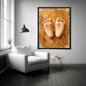 Neutral baby footprints canvas art for warm nursery and family room decor.