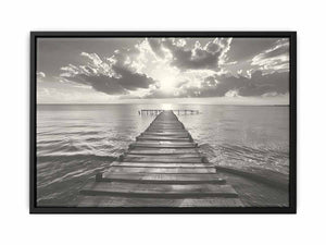Black and white wooden pier over calm sea with clouds for bedroom decor.