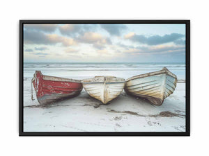 Weathered wooden boats on beach canvas art for coastal living room decor.