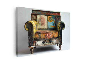 Vintage painted armchair canvas art with distressed texture for eclectic office decor.