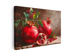 Red pomegranate still life canvas art with seeds and leaves for elegant kitchen decor.