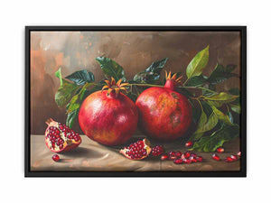 Elegant pomegranate still life canvas art with red fruit and green leaves for kitchen decor.