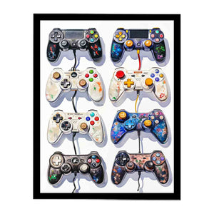 Gaming controller wall art with colourful vintage gamepads for teen bedroom decor.