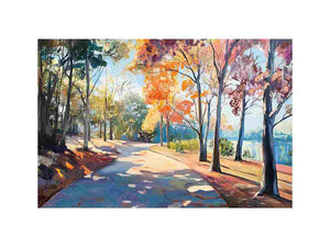 Sunlit autumn pathway canvas art with colorful trees and lakeside scenery for elegant living room decor.
