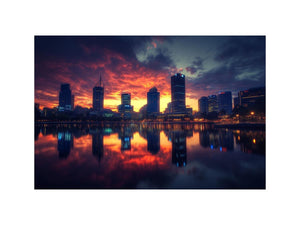 Dramatic city skyline photography with sunset reflections for modern office decor.
