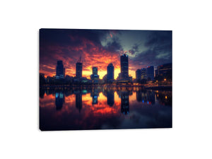 Dramatic city skyline photography with sunset reflections for modern office decor.