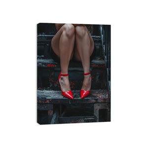 Fashion portrait canvas art with red heels and industrial stairs for bold bedroom decor.