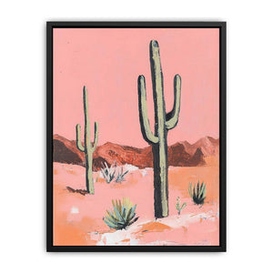 Pink desert cactus canvas art with saguaro plants and mountains for warm southwestern decor.