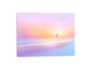 Pastel coastal beach scene with flying seabird for serene modern living room decor