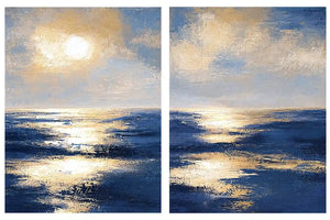 Blue and gold ocean canvas art with sunlit waves for luxury living room decor.