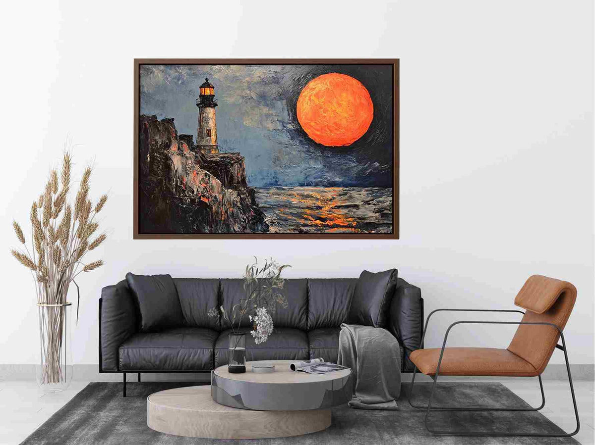 Coastal lighthouse canvas art with orange moon, ocean, and rocky cliffs for modern living room decor.