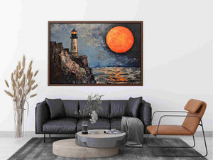 Coastal lighthouse canvas art with orange moon, ocean, and rocky cliffs for modern living room decor.
