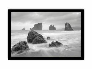 Black and white coastal landscape photography for serene living room decor