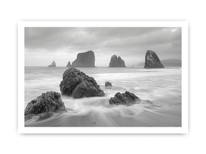 Black and white coastal landscape photography for serene living room decor