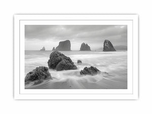 Black and white coastal landscape photography for serene living room decor