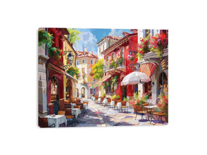 Colorful European cafe street canvas art for warm kitchen or dining room decor.
