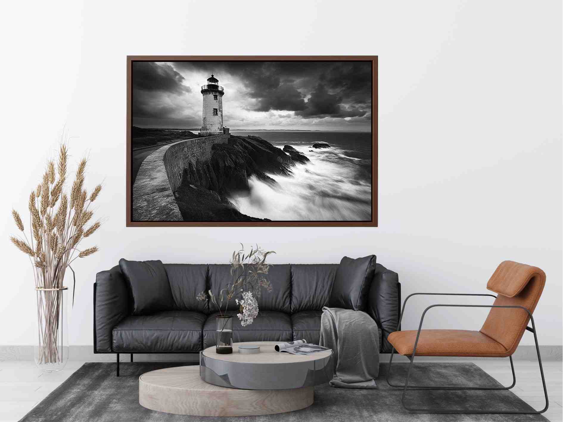 Moody black and white lighthouse wall art with storm clouds for modern living room decor.