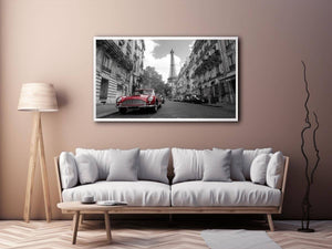 Black and white Paris canvas print with red car for elegant wall decor.