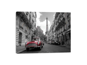 Black and white Paris canvas print with red car for elegant wall decor.