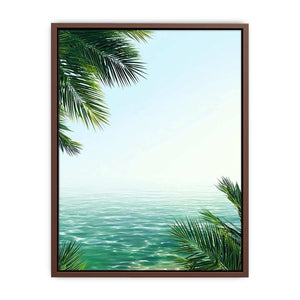 Minimal coastal ocean canvas art with palm leaves for relaxing bedroom decor.