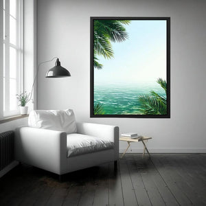 Minimal coastal ocean canvas art with palm leaves for relaxing bedroom decor.