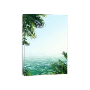 Minimal coastal ocean canvas art with palm leaves for relaxing bedroom decor.