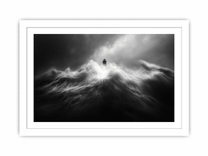 Black and white lighthouse wall art with storm waves for modern office decor.