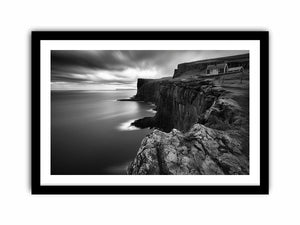 Black and white coastal cliff photography for modern living room decor.