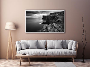 Black and white coastal cliff photography for modern living room decor.