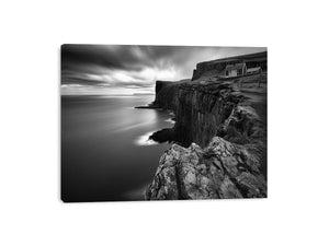 Black and white coastal cliff photography for modern living room decor.