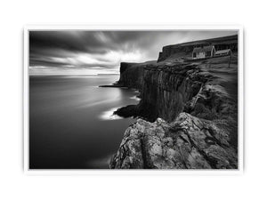 Black and white coastal cliff photography for modern living room decor.