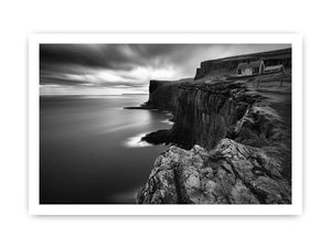 Black and white coastal cliff photography for modern living room decor.