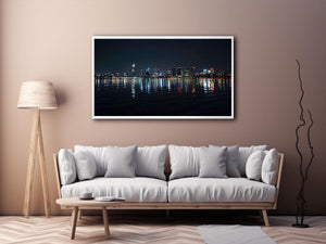 Night city skyline artwork with reflections for modern office decor.