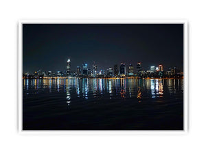 Night city skyline artwork with reflections for modern office decor.