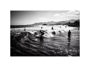 black and white surfing wave with surfers ocean wall art canvas