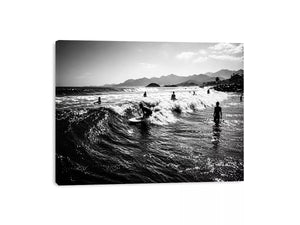 black and white surfing wave with surfers ocean wall art canvas