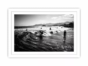 black and white surfing wave with surfers ocean wall art canvas