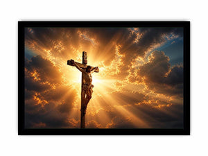 Jesus on the cross illuminated by heavenly golden light with dramatic clouds Christian wall art canvas print